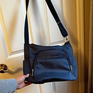Traveling cross body bag (NWT)